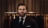 Oscar Jacobson story case fashion Oscar Jacobson wearing a suit
