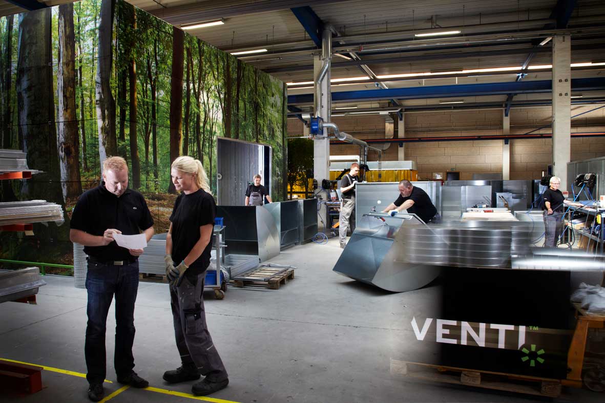 a customer refrenece video, metal work and people