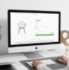 Computerbildschirm zeigt einen B2B-Webshop mit konfigurierbarem Stuhl, Produktoptionen und Warenkorb für Möbelunternehmen.