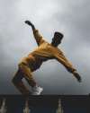Man dancing on rooftop