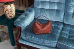 Becksöndergaard case story red bag on blue sofa